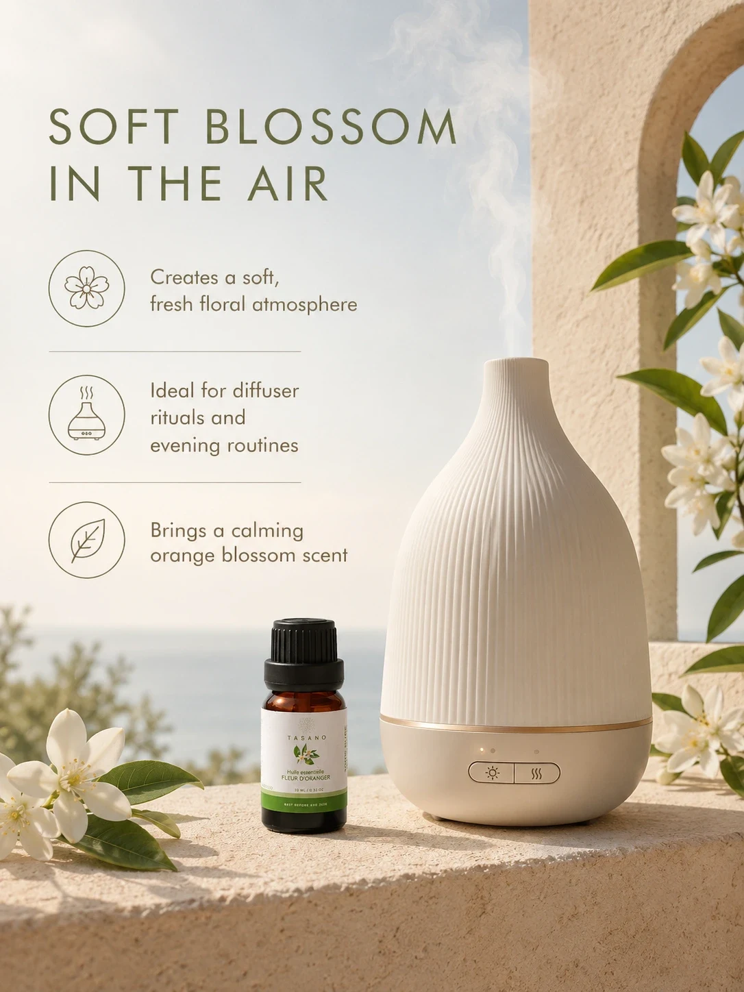 TASANO orange blossom essential oil beside a modern diffuser, creating a soft floral home fragrance atmosphere.