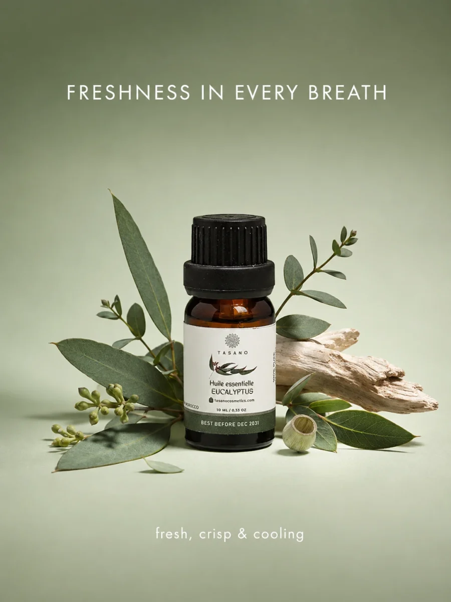 TASANO eucalyptus essential oil bottle surrounded by eucalyptus leaves in a clean fresh scent profile visual.