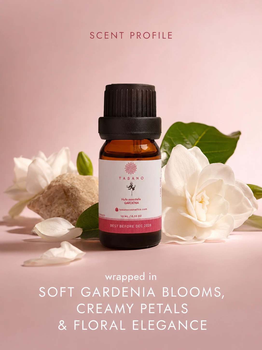 TASANO gardenia essential oil bottle surrounded by gardenia flowers in an elegant floral scent profile.