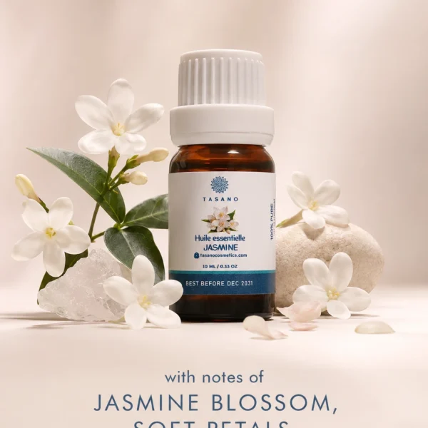 TASANO jasmine essential oil bottle surrounded by jasmine flowers in a delicate floral scent profile. TASANO jasmine essential oil bottle surrounded by jasmine flowers in a delicate floral scent profile.