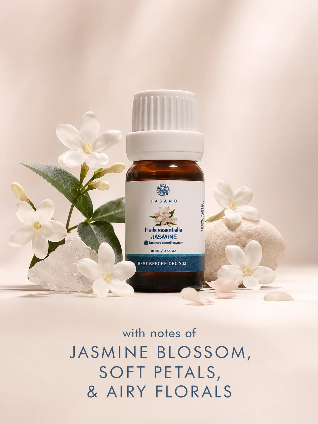 TASANO jasmine essential oil bottle surrounded by jasmine flowers in a delicate floral scent profile.