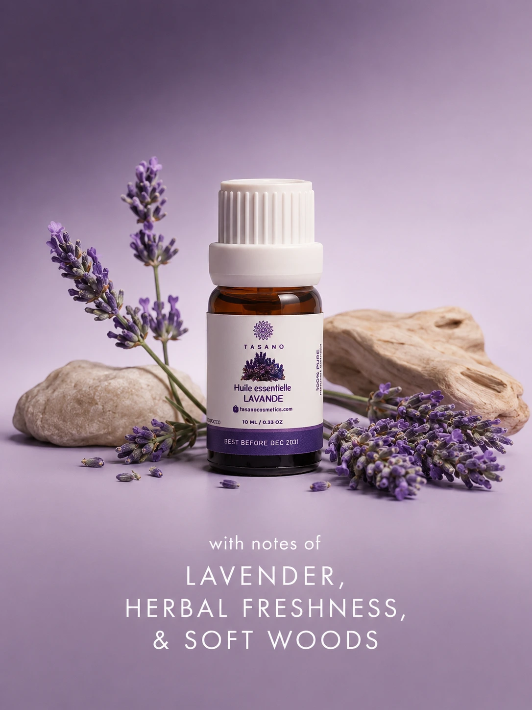 TASANO lavender essential oil bottle surrounded by lavender flowers in a relaxing aromatic scent profile.
