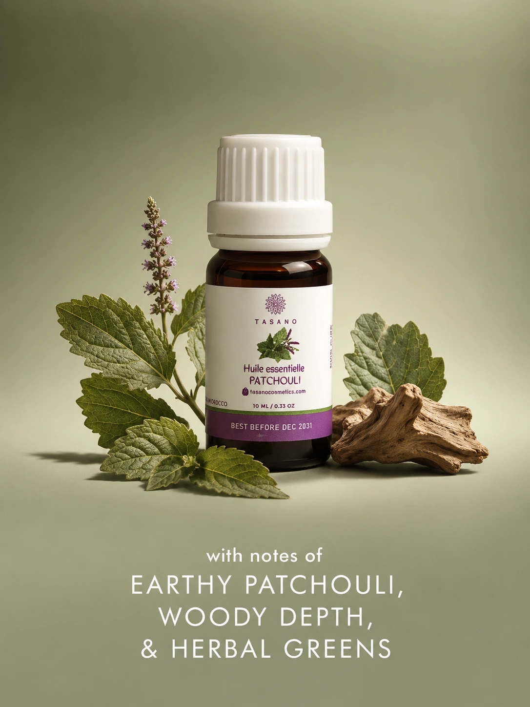 TASANO Patchouli essential oil bottle surrounded by patchouli leaves and warm botanical elements showing its deep earthy, woody and aromatic scent profile.