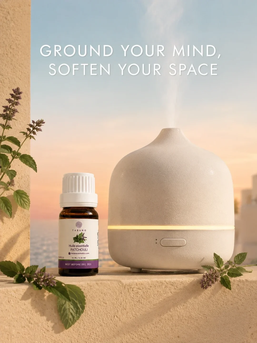 TASANO Patchouli Essential Oil beside an active diffuser for a grounding earthy aromatherapy atmosphere.