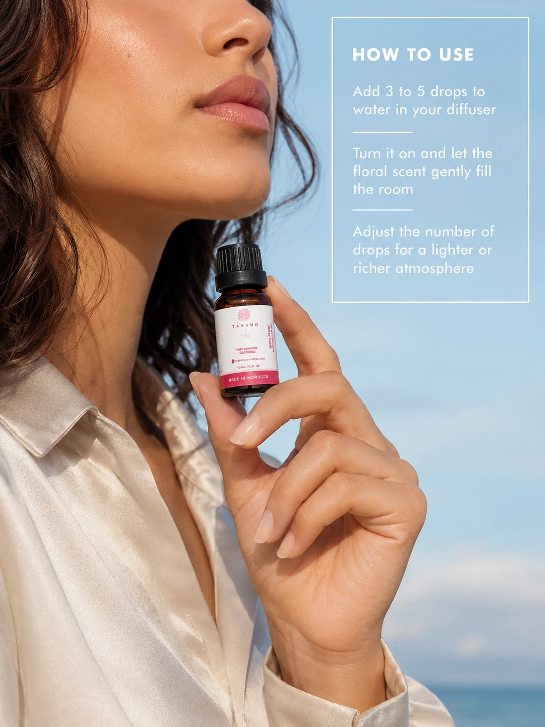 TASANO gardenia essential oil bottle held by a Moroccan model with simple diffuser use instructions.