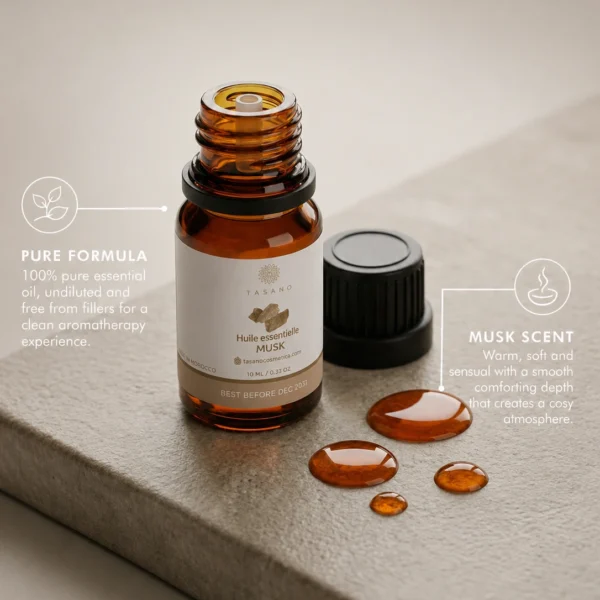 TASANO Musk Essential Oil with amber oil drops, 100% pure formula, and soft warm musky scent profile.