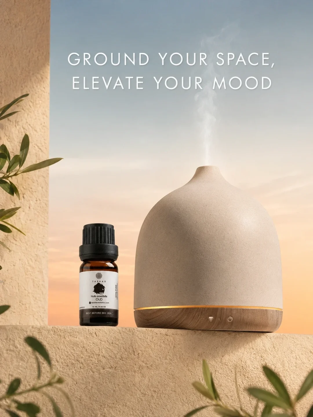 TASANO Oud Essential Oil beside an active diffuser for a deep woody Moroccan aromatherapy atmosphere.