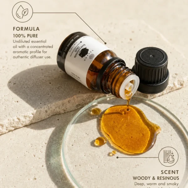 TASANO Oud Essential Oil with golden oil texture, 100% pure formula, and deep woody resinous scent profile.