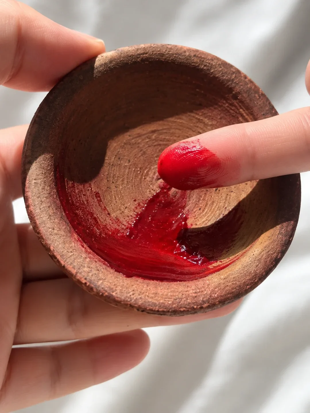 Aker Fassi Moroccan lipstick activated with rose water in clay tajine pot, natural red lip and cheek stain for buildable Moroccan color Aker Fassi Moroccan lipstick activated with rose water in clay tajine pot, natural red lip and cheek stain for buildable Moroccan color